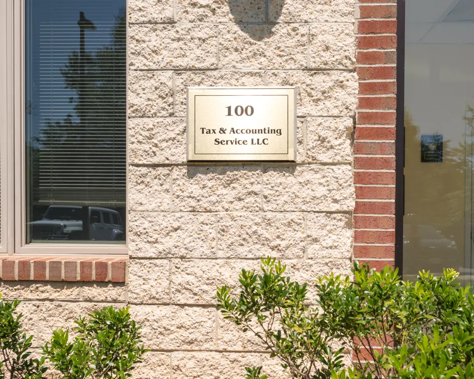 The suite 100 entrance of Tax & Accounting Service LLC